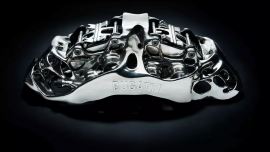Den Bugatti-Entwicklern ist es erstmals gelungen, einen Bremssattel zu entwerfen, der im 3-D-Druck hergestellt werden kann. 